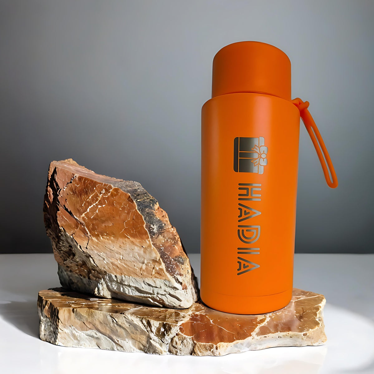 Orange 1L triple insulated gym bottle on the go with clear straw lid