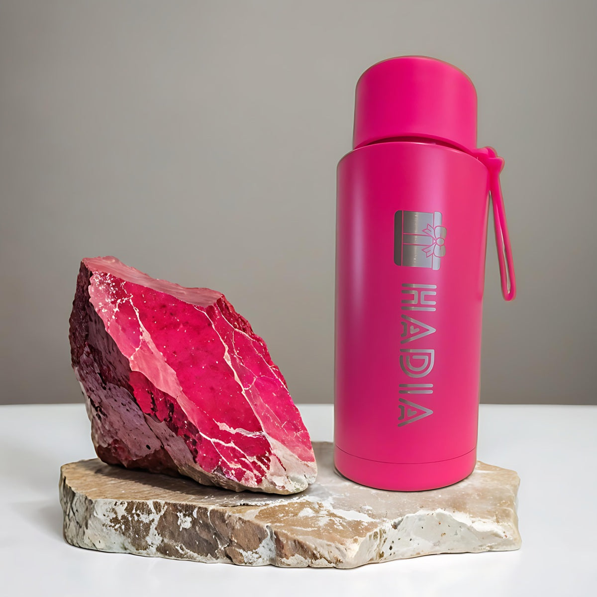 Pink 1L insulated drink bottle with leakproof design for fitness